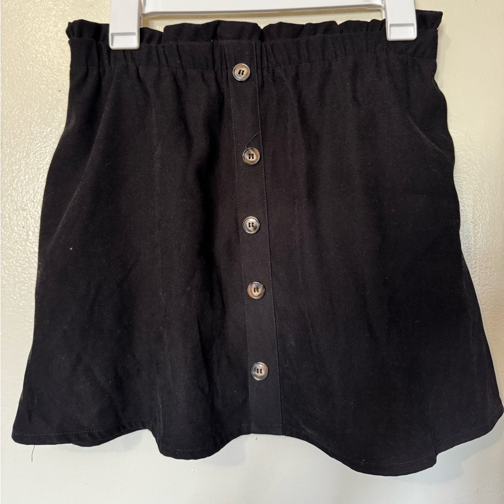 Women’s black button up skirt